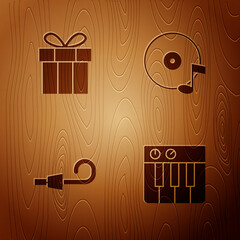 Set Music synthesizer, Gift box, Birthday party horn and Vinyl disk on wooden background. Vector