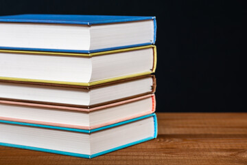 Old colorful books isolated on white background