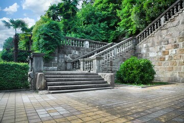 Architectural detail of marble steps with tree