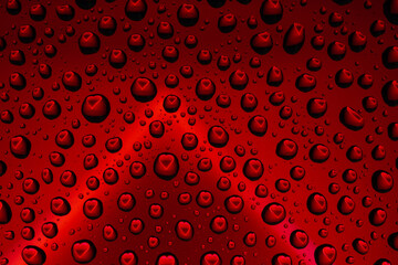 Water drop reflections of a red heart.