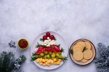 Cheese plate with salami in shape of tree.