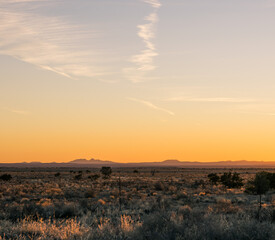 orange sunset sky and mountains