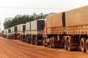 Mato Grosso Brazil, October 01, 2004: Truck stopped in row on a rural road - obrazy, fototapety, plakaty
