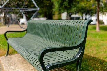 a close-look green metal chair