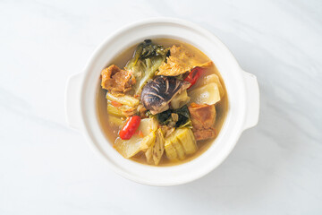 boiled pickled cabbage and bitter gourd soup