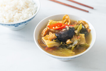 boiled pickled cabbage and bitter gourd soup