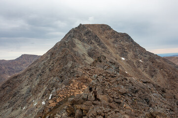 The concept of outdoor activities in the mountains. Minimalist mountain landscape. Atmospheric view. The majestic nature of the Circumpolar Urals.