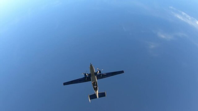 Skydiving. First person view. Jumping out of a plane and free falling.