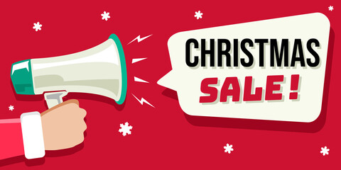 Hand holding megaphone with speech bubble and christmas sale announcement