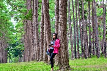 portrait of a woman in the pine forest