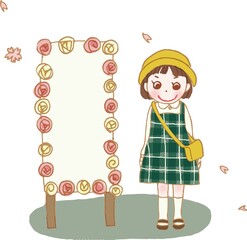 看板の横に立つ女の子。