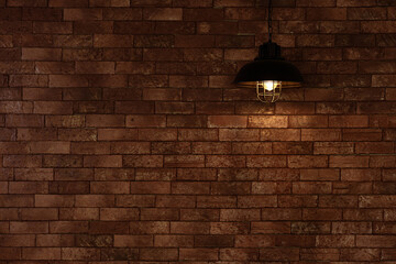 brick wall with hang light bulb industry loft style interior decoration for background