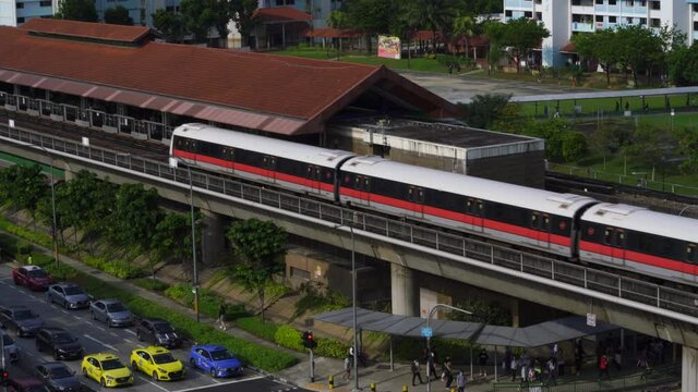 SINGAPORE, SINGAPORE - Sep 20, 2021: Singapore, September 20, 2021: Early morning mrt train arriving  Yishun station.  Singapore public transport