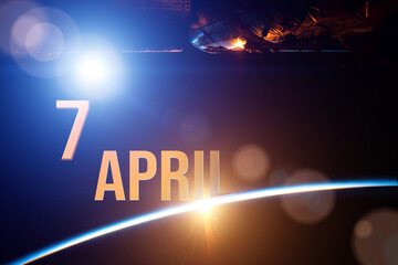 April 7th. Day 7 of month, Calendar date. The spaceship near earth globe planet with sunrise and calendar day. Elements of this image furnished by NASA. Spring month, day of the year concept.