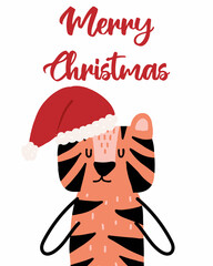 Obraz premium Hand-drawn Christmas card with a tiger in hat. Christmas lettering. Postcard with the symbol of the year 2022.
