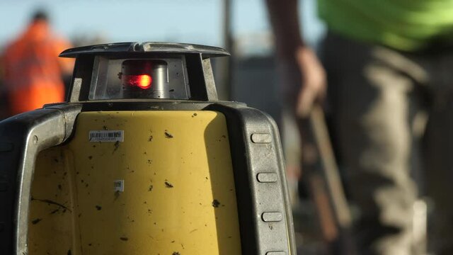 Laser Levelling Machine Spinning On Construction Site, CLOSE UP