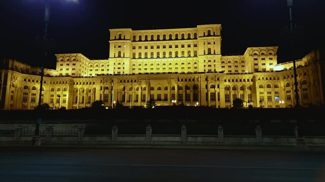 Static shot of Romanian Palace of Parliament illuminated at Night, Bucharest