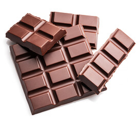 Pieces of dark chocolate bar isolated on white background. Sweet food is made of cocoa and sugar.