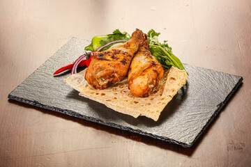 Chicken leg barbecue served salad leaves