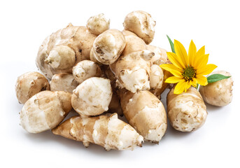 Jerusalem artichoke roots with leaves and flower of Jerusalem artichoke isolated on white background.