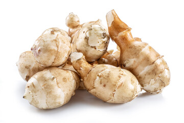 Jerusalem artichoke roots isolated on white background.