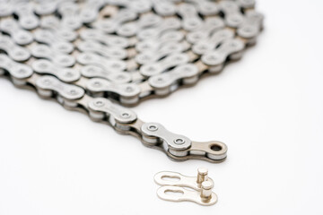 Gears, sprockets and chain of a mountain sports bike on a white background. Bicycle parts