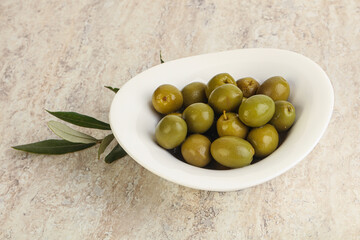 Tasty marinated olives in the bowl