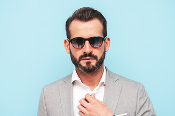 Closeup portrait of handsome confident stylish hipster lambersexual model.Sexy modern man dressed...