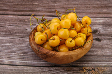 Sweet ripe yellow cherry heap