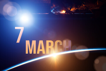 March 7th. Day 7 of month, Calendar date. The spaceship near earth globe planet with sunrise and calendar day. Elements of this image furnished by NASA. Spring month, day of the year concept.