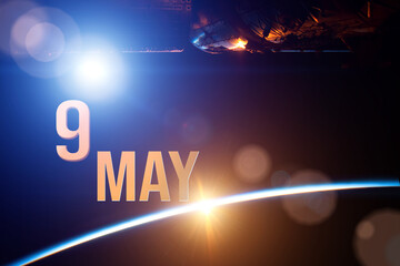 May 9th. Day 9 of month, Calendar date. The spaceship near earth globe planet with sunrise and calendar day. Elements of this image furnished by NASA. Spring month, day of the year concept.