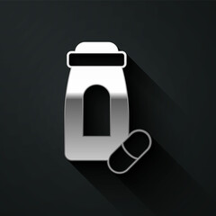 Silver Sedative pills icon isolated on black background. Long shadow style. Vector