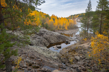 Obraz premium Remains of the most ancient on the earth volcano Girvas in Karelia in autumn, Russia