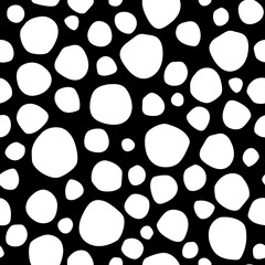 Seamless abstract pattern with black shabby spots on white background.