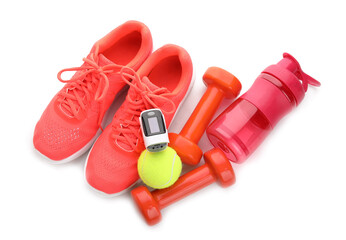 Set of sports items and pulse oximeter on white background