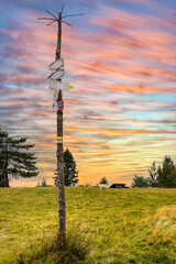 Symbolic way finder guide on top of Potrojna peak in Little Beskids of Beskidy Mountains in Lesser Poland © Art Media Factory
