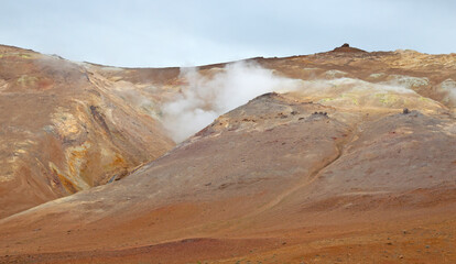 Steaming fumarole in geothermal area of Hverir, Iceland