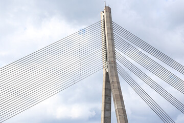 Obraz na płótnie Canvas Close details of old large suspension bridge.