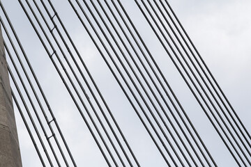 Close details of old large suspension bridge.