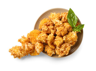 Plate with crunchy popcorn chicken on white background