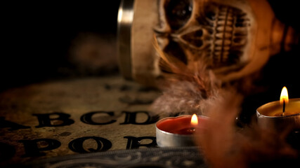Props for the witches' rite. Halloween props. Skull and candles for the ritual