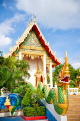 Beautiful Wat Karon Buddhist temple travel summer trip famous landmark in Thailand.