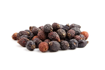 Dried rose hip fruits herbal tea isolated on white