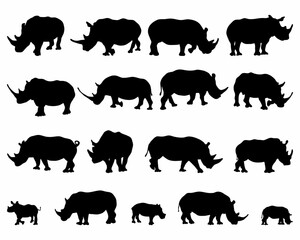 Black silhouettes of rhinos on a white background
