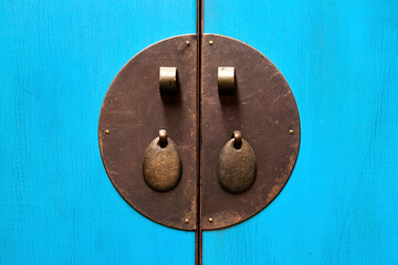antique wooden closet with brass handle 