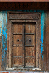 antique wooden door with brass door handle 