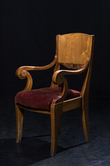 Armchair on a stage. Interior of a theatre hall..