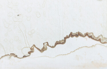 Water leakage - marks and stains on a white painted wall after rain or melting snow