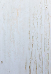 Water leakage - marks and stains on a white painted wall after rain or melting snow
