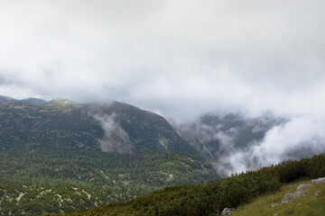Fototapeta na wymiar View to the cloudy top of the mountains in Upper-Austria, Salzkammergut